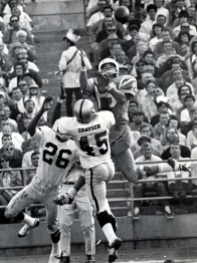 Charger receiver Lance Alworth catches pass against the Raiders Dave Grayson and Nemiah Wilson. 1969 Photo Ron Riesterer